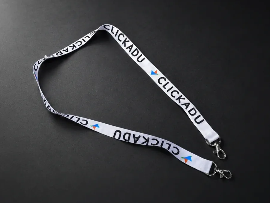 Custom printed event lanyard on a dark background