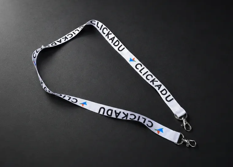Custom printed event lanyard on a dark background